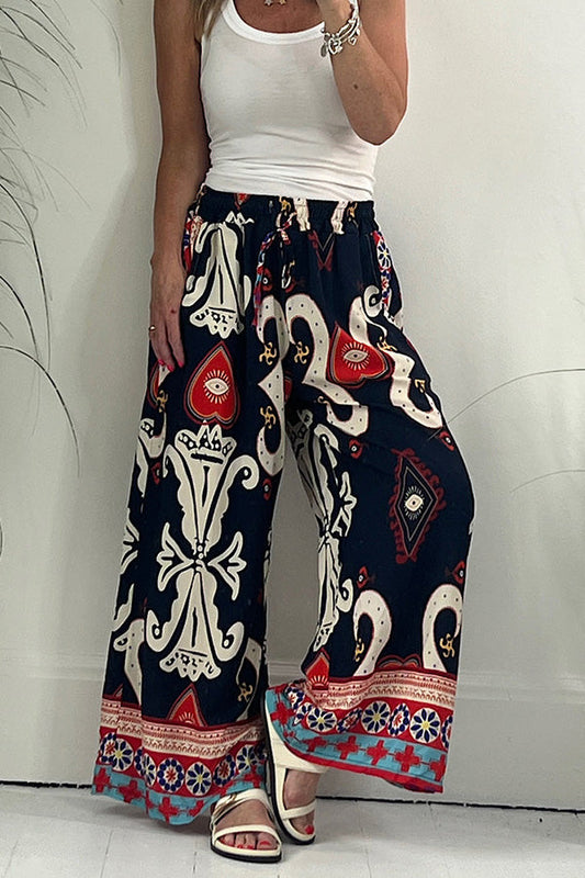 Pantalones con cintura elástica y cordón ajustable con bolsillos y estampado de Reina de Corazones