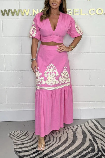 Conjunto elegante de top corto con cuello en V y mangas abullonadas y falda larga con paneles y cintura elástica