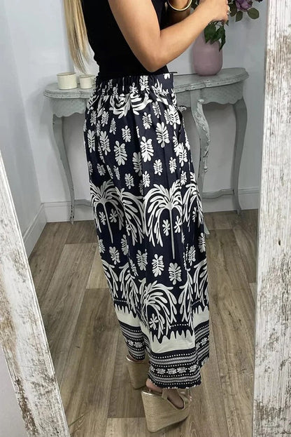 Pantalones anchos de pierna para vacaciones con bolsillo suelto y cintura elástica con estampado único