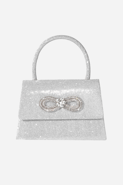Bolso con asa de diamante y brillo metálico 