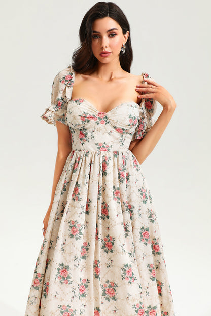 Vestido midi con abertura y encaje, espalda descubierta, mangas abullonadas y estampado floral, color rosa 