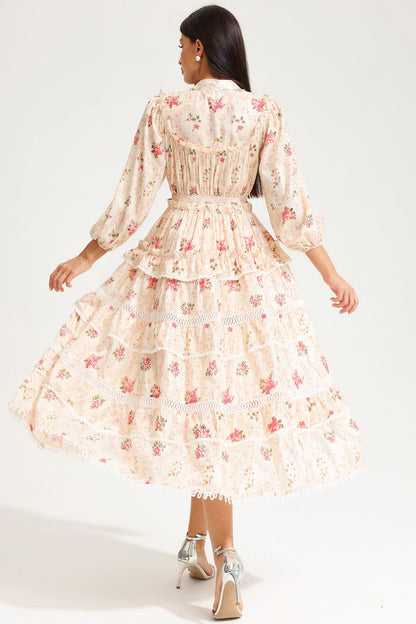 Vestido midi amarillo con hebilla y mangas farol con estampado floral 