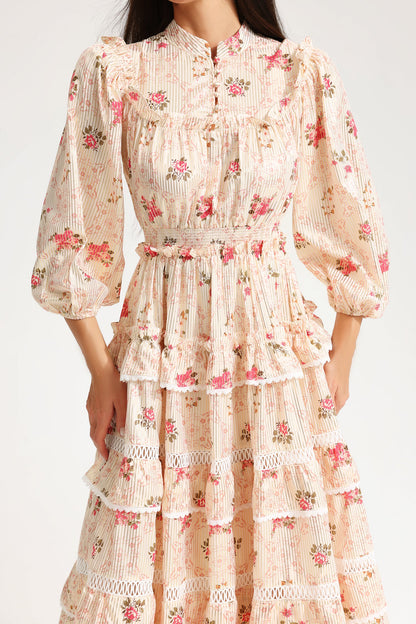 Vestido midi amarillo con hebilla y mangas farol con estampado floral 