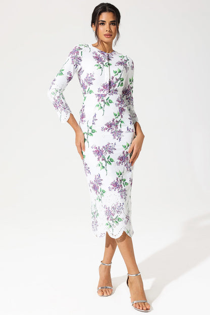 Vestido largo con bordado inglés, cuello redondo y manga larga con estampado floral 