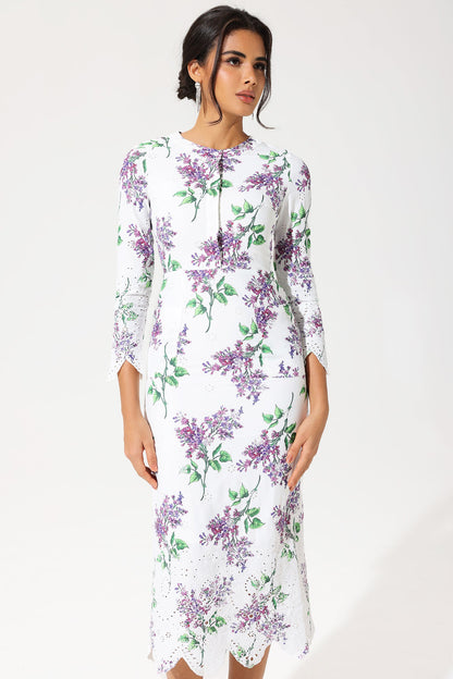 Vestido largo con bordado inglés, cuello redondo y manga larga con estampado floral 