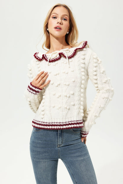 Suéter de lana de manga larga con cuello redondo y crochet 