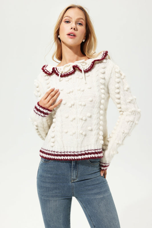 Suéter de lana de manga larga con cuello redondo y crochet 