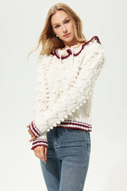 Suéter de lana de manga larga con cuello redondo y crochet 