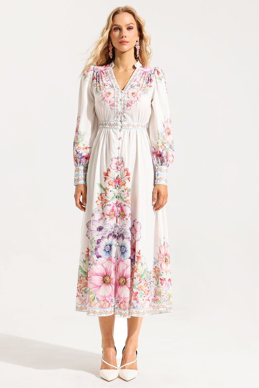 Vestido midi de manga larga con botones y volantes