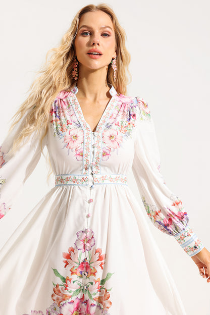 Vestido midi de manga larga con botones y volantes