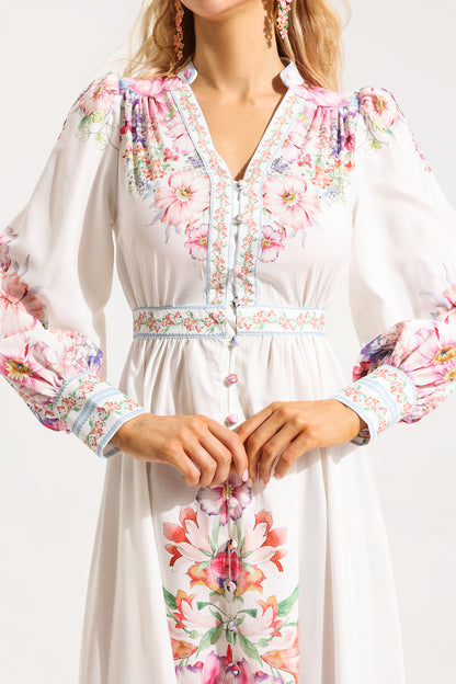 Vestido midi de manga larga con botones y volantes