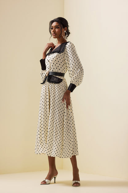 Vestido midi de encaje con lunares, mangas farol y cinturón 