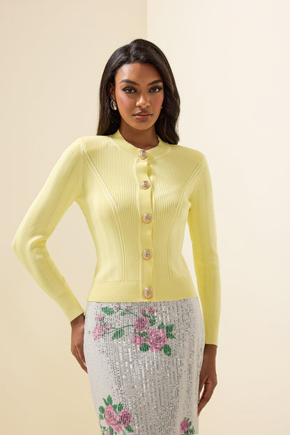 Top de cuello redondo de punto con botones metálicos 