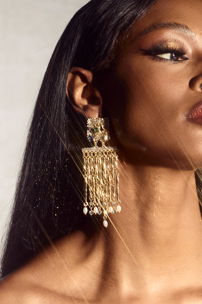 Pendientes colgantes con borlas y ojos de gemas 