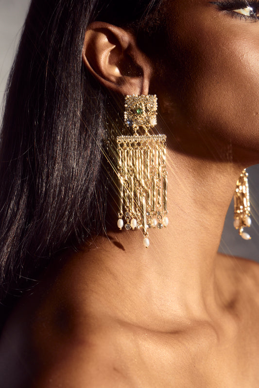 Pendientes colgantes con borlas y ojos de gemas 