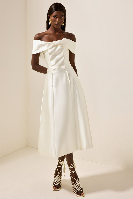 Vestido midi liso plisado con nudo 