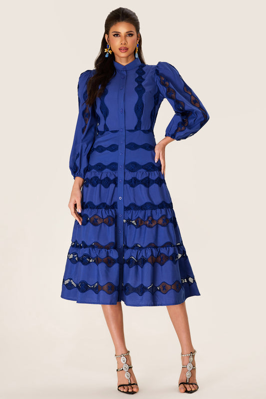 Vestido midi con bajo liso bordado 