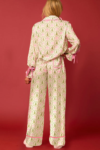 Conjunto de top de terciopelo con estampado navideño, manga larga, bolsillos y pantalones anchos con cintura elástica.