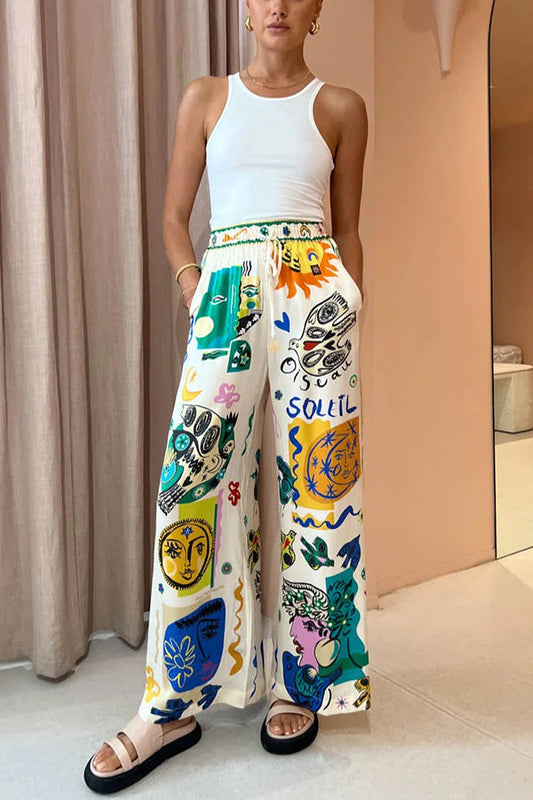 Pantalones anchos con bolsillos y cintura elástica con estampado único Meralda