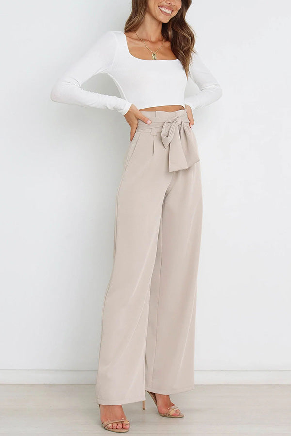 Pantalones anchos con bolsillos y cinturón de moda