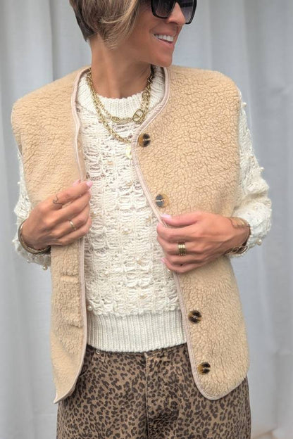 Chaleco con botones de moda