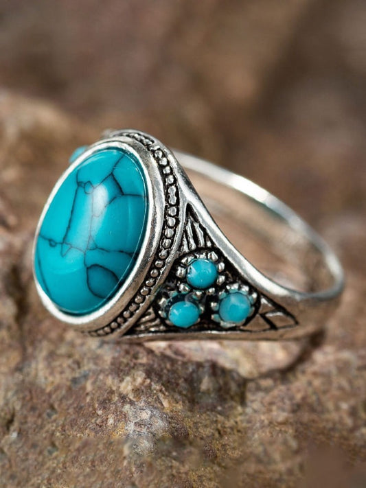 Anillo de plata de ley con exquisita piedra azul 