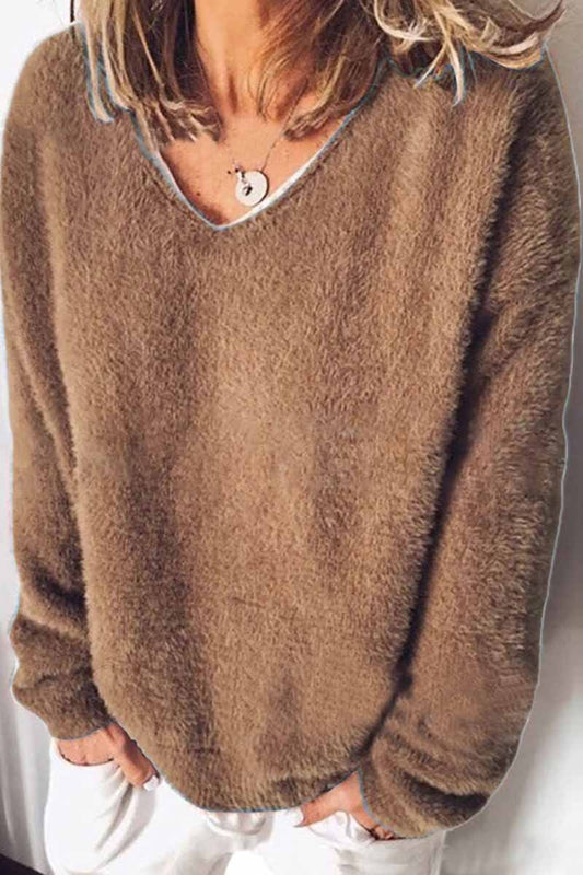 Top holgado de color liso con cuello en V