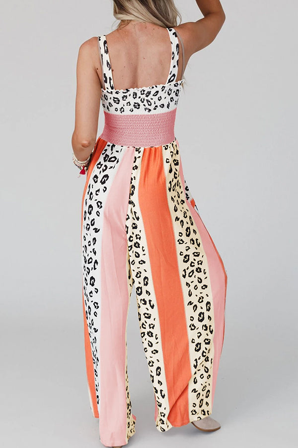 Mono con tirantes y estampado de leopardo en bloques de color rosa
