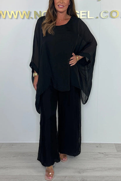 Conjunto de top holgado con cuello redondo y mangas murciélago de color liso y pantalones anchos con cintura elástica