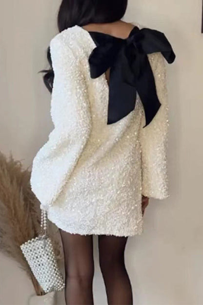 Vestido de fiesta de lentejuelas con lazo en la espalda y mangas largas