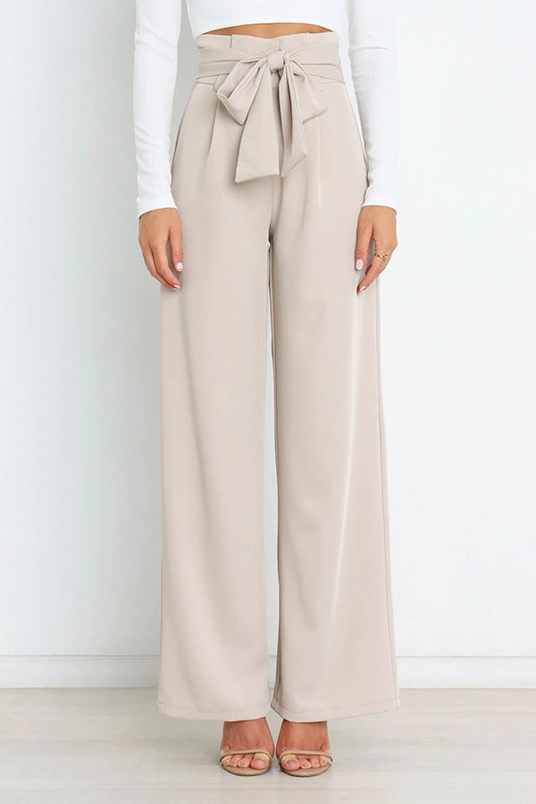 Pantalones anchos con bolsillos y cinturón de moda