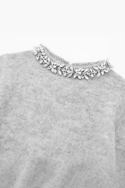 Jersey de punto con cuello redondo y adornos de cristales 