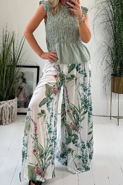 Pantalones palazzo de pierna ancha con cintura fruncida y estampado botánico de jardín de verano