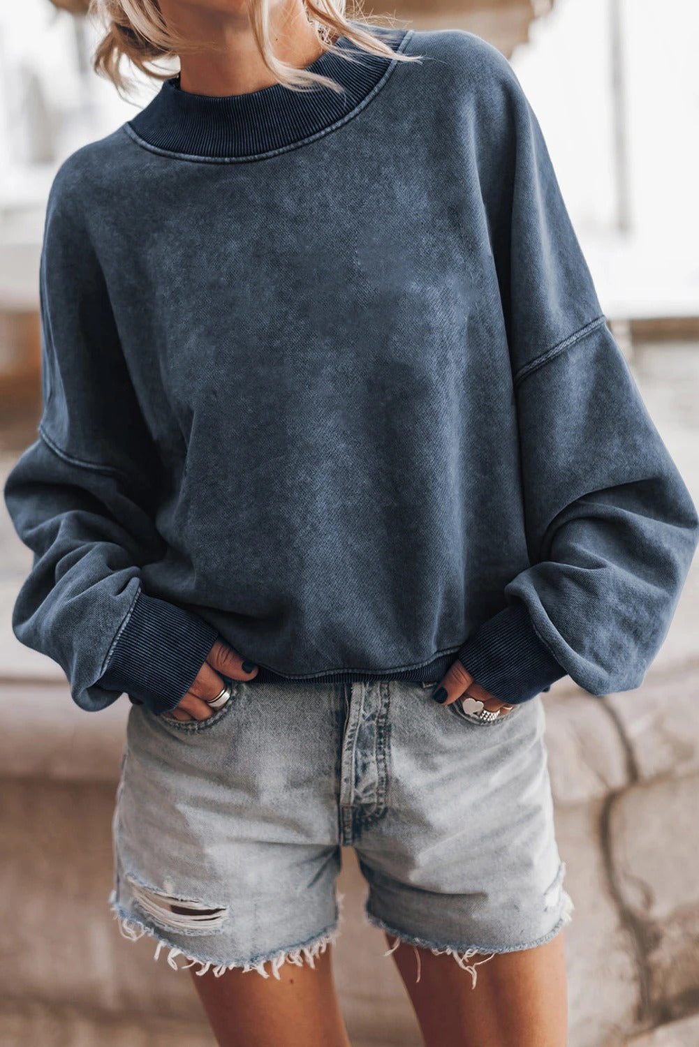 Sudadera lavada con hombros caídos