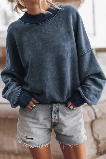 Sudadera lavada con hombros caídos
