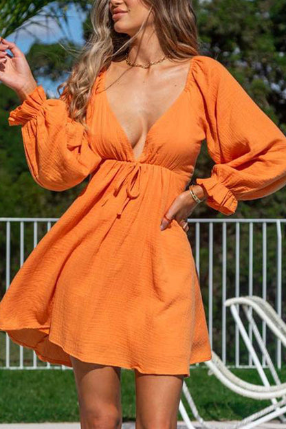 Vestido sexy de manga larga con escote en V profundo y espalda descubierta