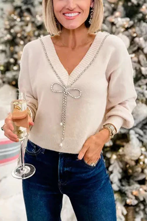 Suéter con lazo elegante