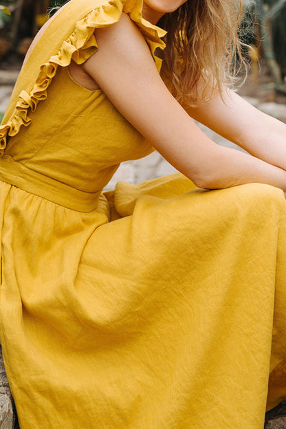 VESTIDO DE LINO CON MANGAS CON VOLANTES Y ESPALDA DESCONECTADAS