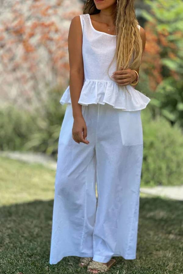 Conjunto de dos piezas de top sin mangas y pantalones anchos de algodón y lino en color liso