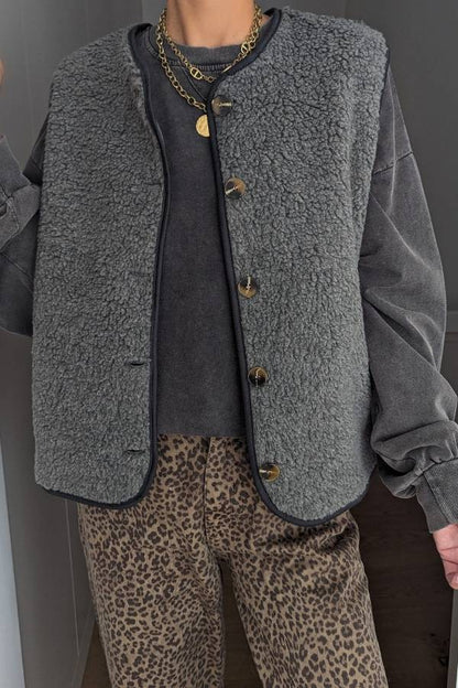 Chaleco con botones de moda
