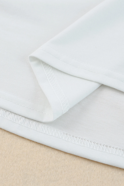 Blusa informal de color blanco liso con mangas abullonadas