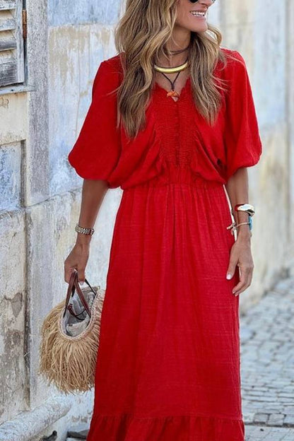 Vestido largo holgado con volantes y cuello en V