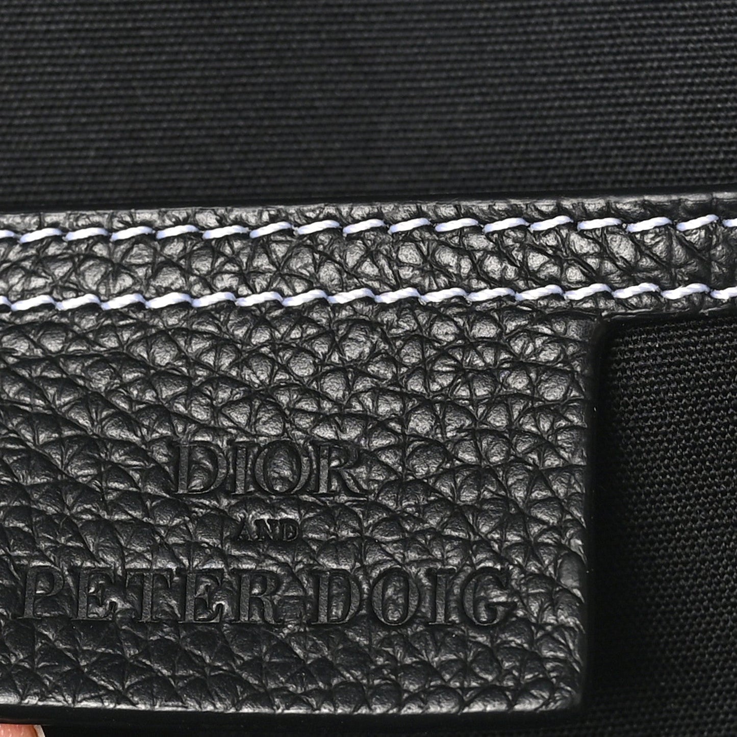 X PETER DOIG Grained Calfskin Slingbag Backpack Black