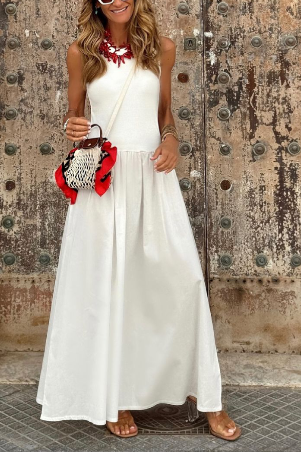 Vestido largo blanco con cintura suelta, cuello redondo, sin mangas y dobladillo