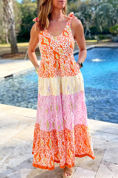Vestido escalonado con bloques de color de leopardo y tirantes anudados en naranja