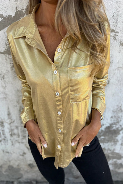 Blusa holgada con botones y bolsillos metalizados de aspecto festivo