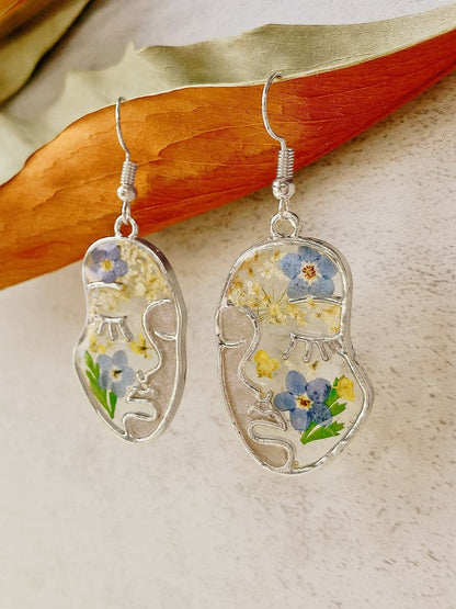 Pendientes de flores prensadas - Cara abstracta Flor no me olvides 