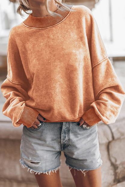 Sudadera lavada con hombros caídos