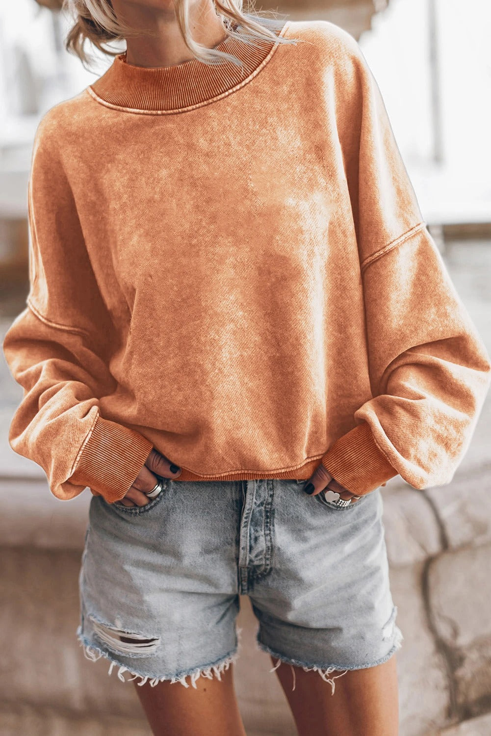 Sudadera lavada con hombros caídos