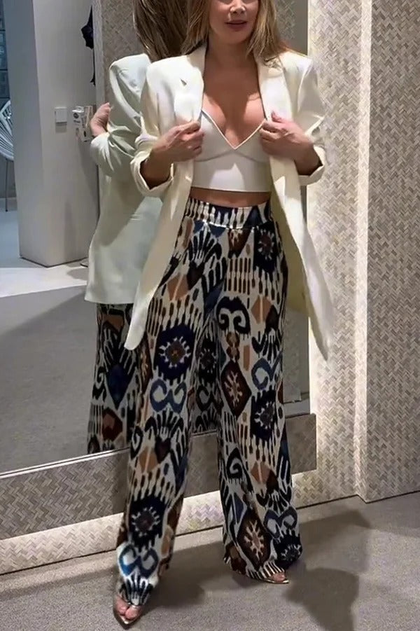 Pantalones anchos con bolsillo y cintura elástica en la espalda con estampado único de Emelia